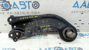 The rear left trailing arm of a Toyota Venza 21-24 AWD has a cracked silent block.