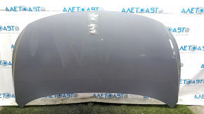 The hood of a Volkswagen ID.4 21-25 gray LA7C, bare steel, dented