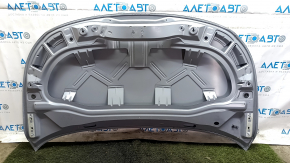 The hood of a Volkswagen ID.4 21-25 gray LA7C, bare steel, dented
