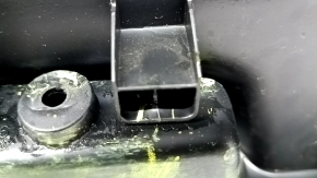 Jeep Renegade 15-23 black tailgate trim with scratches, cracks in fasteners, and abrasions
