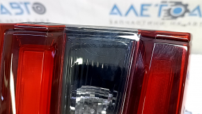Nissan Rogue Sport 20-22 left inner tailgate light scratches