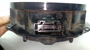 The front right door speaker of a Volkswagen ID.4 21-22 has cracked mountings.
