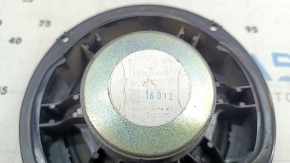 The front left door speaker of a Volkswagen ID.4 21-22 has cracked mounts.