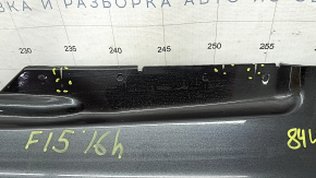 The trunk door is bare, the lower part of the BMW X5 F15 14-18 graphite A90, there are nicks, scratches, and a dent.