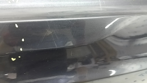 The trunk door is bare, the lower part of the BMW X5 F15 14-18 graphite A90, there are nicks, scratches, and a dent.