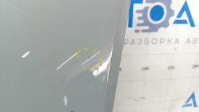 Front right fender of a 2015 Ford Bronco Sport, gray NE, chip, scratch