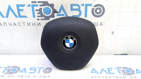 The airbag in the driver's steering wheel of the BMW 3 F30 17-18 Sport is black, the mount is broken.