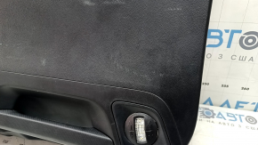 Black lower tailgate trim for a 2021-2025 Ford Bronco Sport with lamps and handles, scratches, and wear.