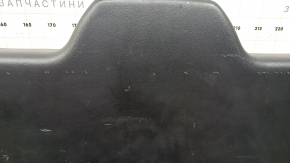 Black lower tailgate trim for a 2021-2025 Ford Bronco Sport with lamps and handles, scratches, and wear.