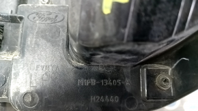 The left headlight of a 2021 Ford Bronco Sport has a broken glass.
