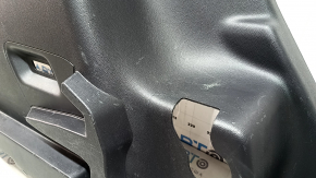 Left arch trim for a 2021-2025 Ford Bronco Sport, black, with hooks, scratches, and wear.