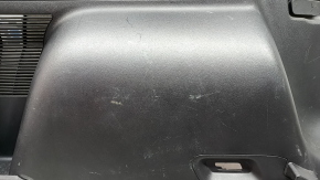 Left arch trim for a 2021-2025 Ford Bronco Sport, black, with hooks, scratches, and wear.