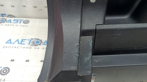 Left arch trim for a 2021-2025 Ford Bronco Sport, black, with hooks, scratches, and wear.