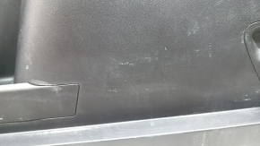 Left arch trim for a 2021-2025 Ford Bronco Sport, black, with hooks, scratches, and wear.