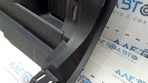 Right arch trim for a 2021-2025 Ford Bronco Sport, black, with hooks, scratches, and wear.
