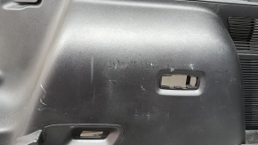 Right arch trim for a 2021-2025 Ford Bronco Sport, black, with hooks, scratches, and wear.