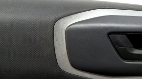 Black front left door panel for a 2021 Ford Bronco Sport with a handle, gray molding, black leather armrest, black cloth insert, scratches, scuff marks, dents