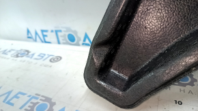 The right trunk tray of the Ford Bronco Sport 21-25 is dented and has tears.