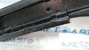 The left trunk tray of the Ford Bronco Sport 21-25 is dented and has tears.