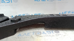 The left trunk tray of the Ford Bronco Sport 21-25 is dented and has tears.