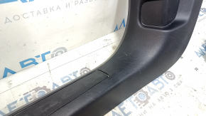 Front left door sill plate for a 2021-2025 Ford Bronco Sport, black, scuffs and scratches, needs cleaning.