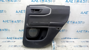 Black rear right door panel for a 2021 Ford Bronco Sport with a handle, gray molding, black leather armrest, plastic insert, scratches, scuffs, dents