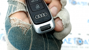 Audi Q8 19-25 key, 4 buttons, glossy black, worn, nicks, scratches