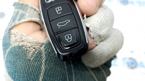 Audi Q8 19-25 key, 4 buttons, glossy black, worn, nicks, scratches