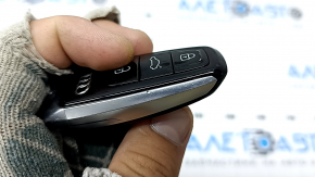 Audi Q8 19-25 key, 4 buttons, glossy black, worn, nicks, scratches