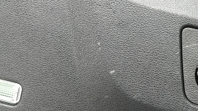 The lower trim of the Audi Q8 19-25 black trunk door without a curtain on the glass, scratches