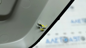The interior mirror cover for the Audi Q8 19-25 is gray and the fasteners are broken.