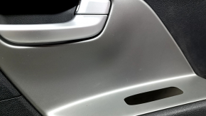 Black front right door panel for a Kia Niro 17-22, gray insert, rubber armrest, scratches, needs cleaning, nicks
