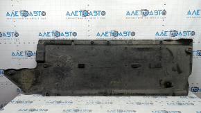 Left underbody protection for Kia Niro 17-22 HEV, PHEV is worn, torn, pinched, and has cracks.