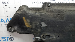 Left underbody protection for Kia Niro 17-22 HEV, PHEV is worn, torn, pinched, and has cracks.