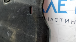 Left underbody protection for Kia Niro 17-22 HEV, PHEV is worn, torn, pinched, and has cracks.