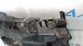 The rear bumper mount under the left light of the Audi A6 C7 16-18 is broken.