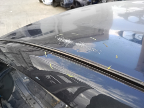Metal roof of Toyota Prius 30 10-15 on the body, dented