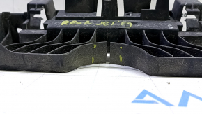 The rear bumper center mount on a 19-21 VW Jetta is cracked.