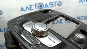 MMI control panel for a 2016-2018 Audi A6 C7, chipped and scuffed, needs cleaning.