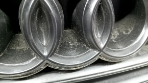 Radiator grille assembly for an Audi A6 C7 16-18, matte finish + gloss black, with a "quattro" emblem, compatible with parking sensors, emblem in film, sand, broken fasteners, bulging film