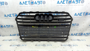 Radiator grille assembly for an Audi A6 C7 16-18, matte finish + gloss black, with a "quattro" emblem, compatible with parking sensors, emblem in film, sand, broken fasteners, bulging film