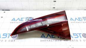 The inner taillight on the right side of the VW Jetta 19-24 has a broken mount.
