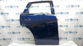 The bare rear right door of a Mazda CX-5 17-24 blue 42M, dents