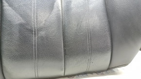 The driver's seat back upholstery for the Audi A6 C7 12-18 is black leather, heated, worn, has scratches, cracks, and needs dry cleaning.