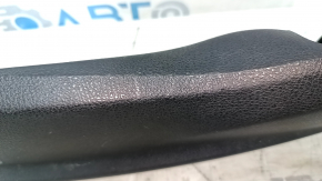 The driver's seat control cover for the Audi A6 C7 12-18 is black, has scratches, and the fasteners are broken.