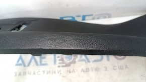The driver's seat control cover for the Audi A6 C7 12-18 is black, has scratches, and the fasteners are broken.