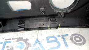 The driver's seat control cover for the Audi A6 C7 12-18 is black, has scratches, and the fasteners are broken.