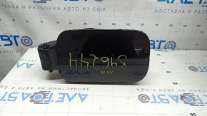The fuel filler flap and housing of the Audi A6 C7 12-18 has a broken mount.