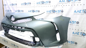 Bare front bumper for a Toyota Prius V 15-17, green, dents, peeling paint, cracks in the mounts
