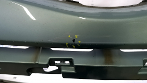 Bare front bumper for a Toyota Prius V 15-17, green, dents, peeling paint, cracks in the mounts